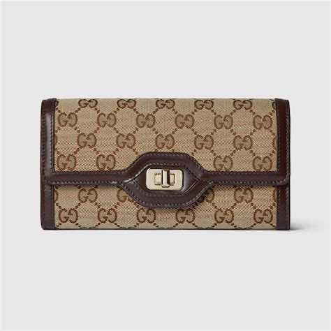 Gucci Luce continental wallet in beige and ebony canvas